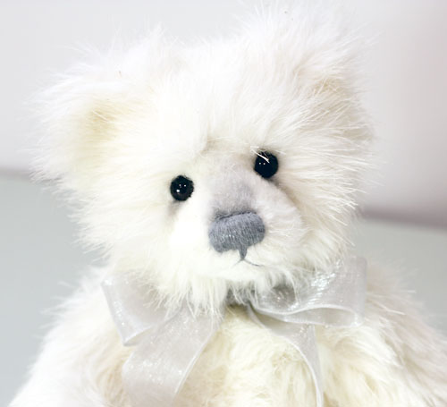 A white teddy bear, Niamh, manufactured by Charlie Bears