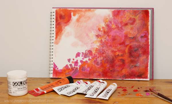 Painting a color-oriented art journal page. See the step-by-step directions on how to make and finish this mixed media art journal page!