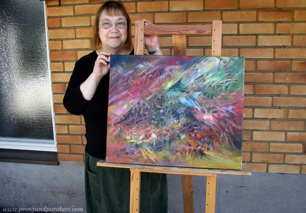 Paivi Eerola and her painting Finch. Read more about her red personality and what she thinks about Thomas Erikson's book Surrounded by Idiots.