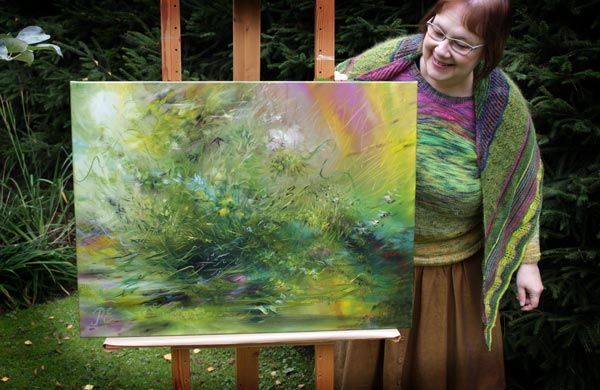 Paivi Eerola and her oil painting "The Echo of Moss"