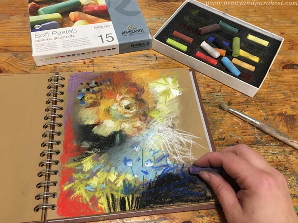 Drawing with soft pastels.