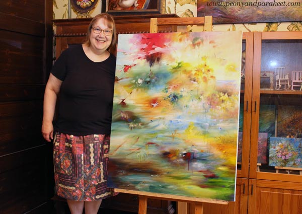 Paivi Eerola and her painting in progress.