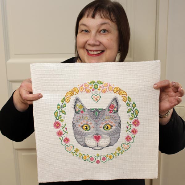 Paivi Eerola and her cross stitch pattern Magical Cat