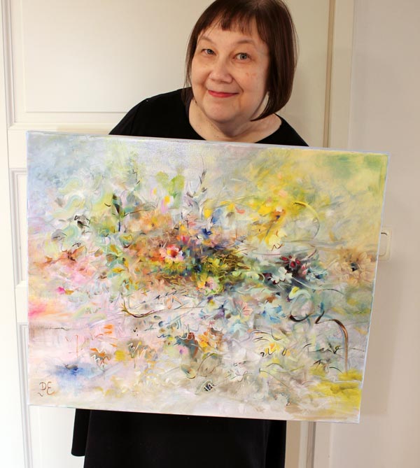 Paivi Eerola and her oil painting Turning Point.