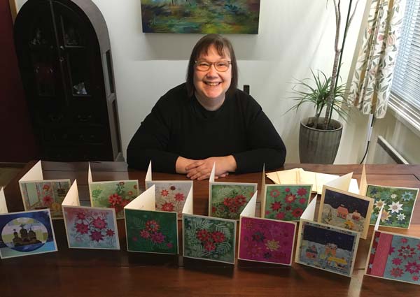 Päivi and her handmade Christmas cards.