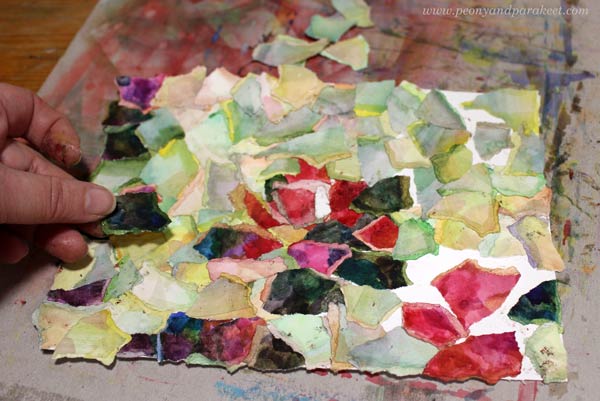 Making a torn paper collage.